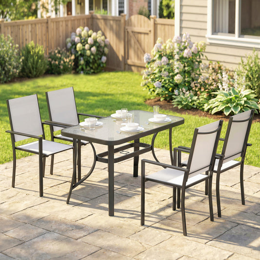 A light grey garden dining set for 4 with umbrella hole, set up on a patio outdoors