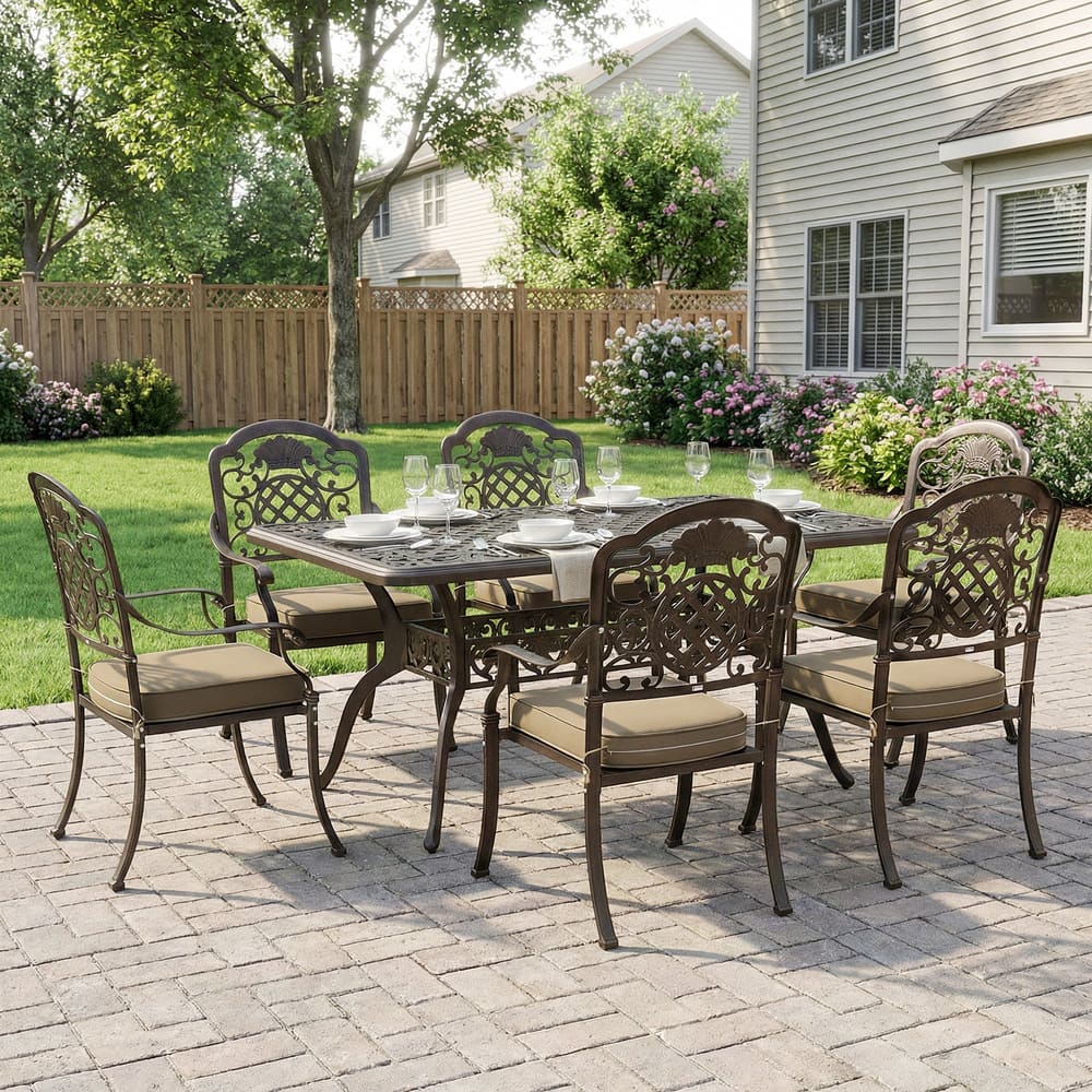 The garden dining set arranged on a paved patio in a lush green backyard