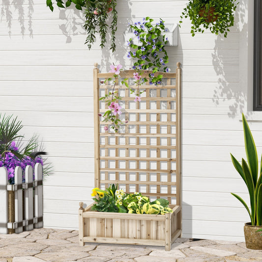 A wooden raised garden bed with a trellis, shown outdoors against a white wall with hanging plants and a small white fence