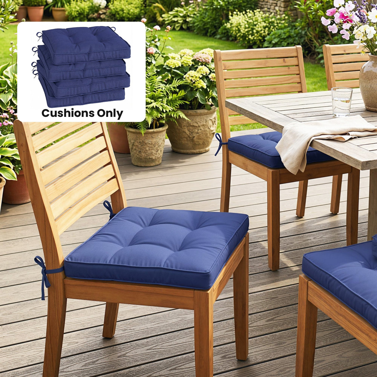 Four dark blue dining chair seat pads with ties arranged on wooden chairs at a table