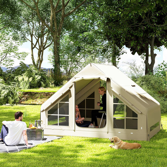 The beige camping tent set up in a garden with two people and a dog outside