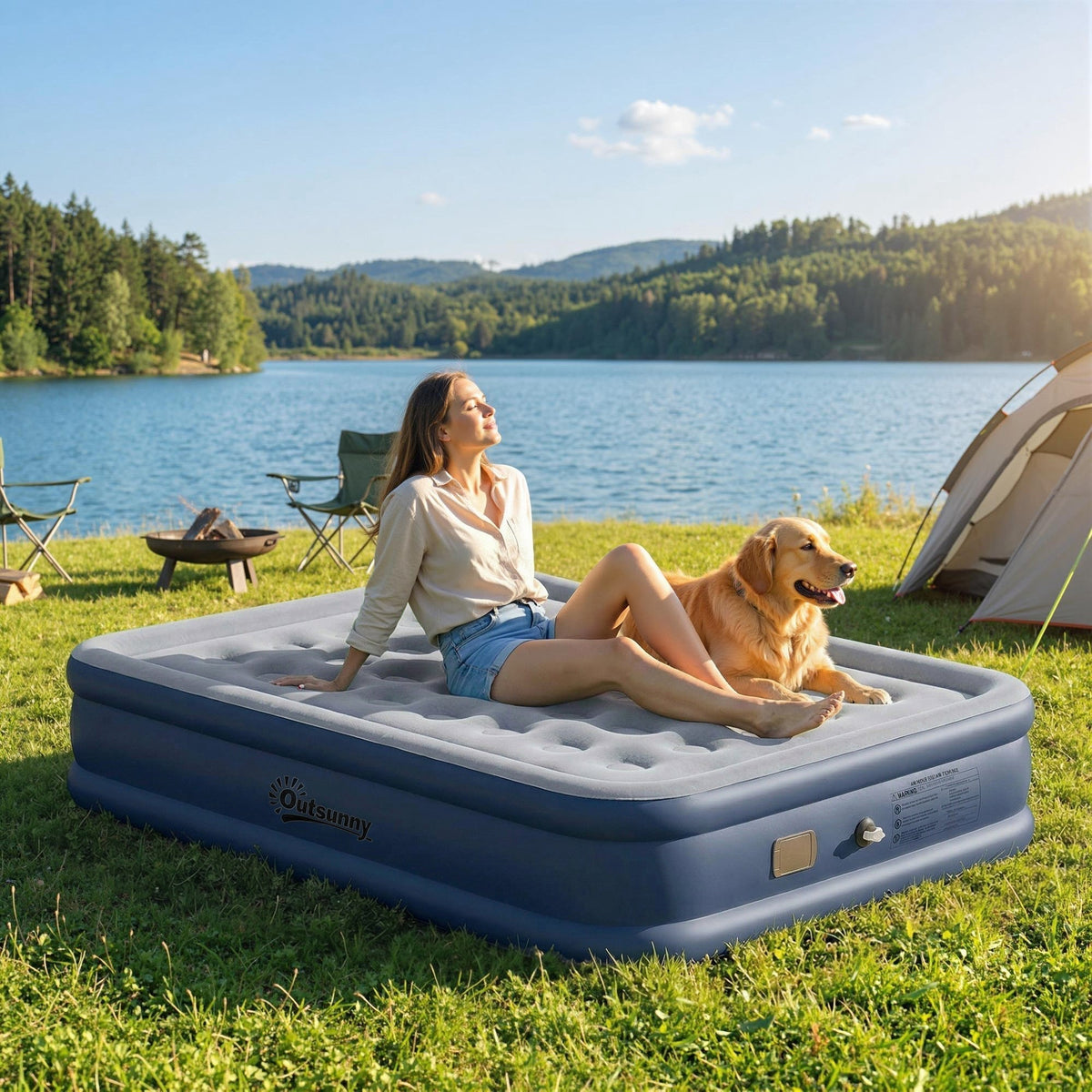 Outsunny Inflatable Mattress, a woman and a golden retriever relaxing on the camping bed by a lake