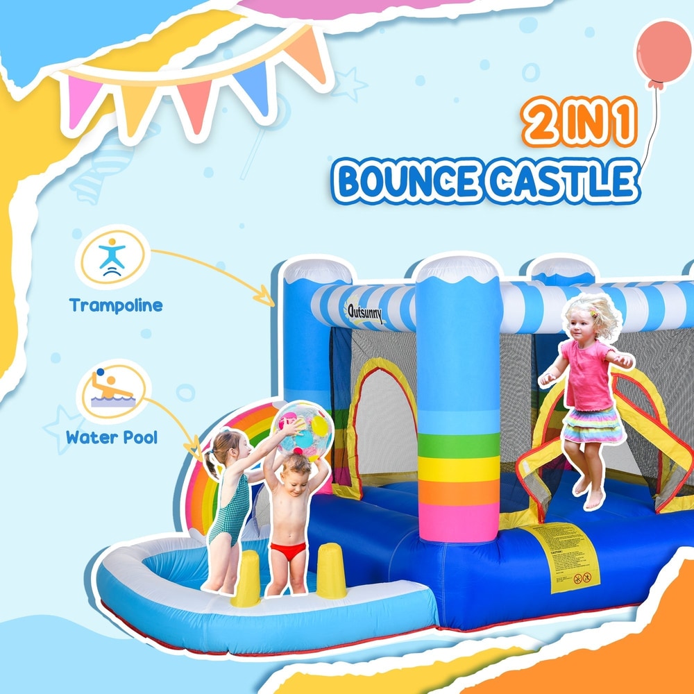 Two children playing in the water pool area of the bouncy castle