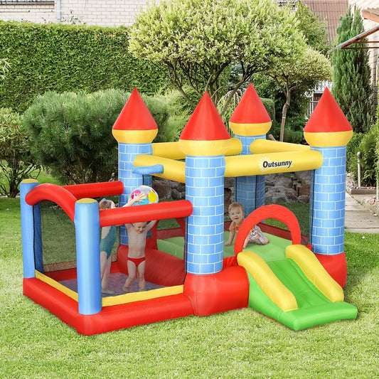 Kids bounce castle with slide and pool in use in a garden setting