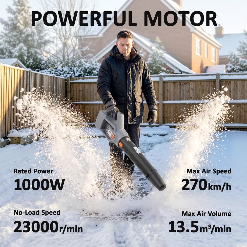A man operating the garden blower, creating a powerful spray of snow