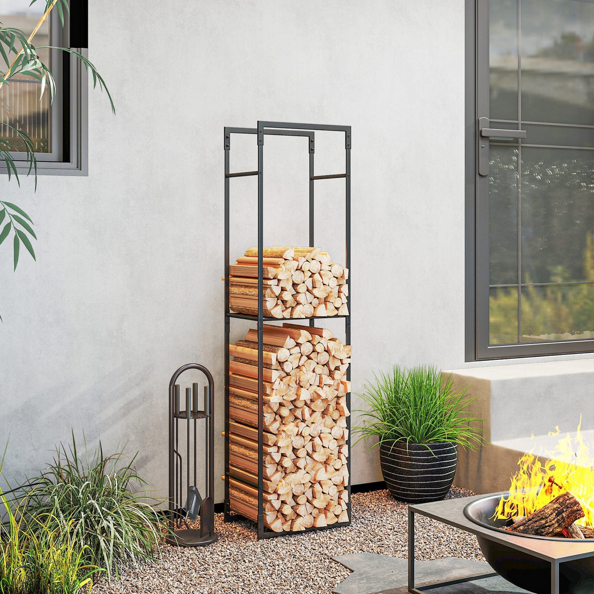 The firewood rack filled with logs on a patio next to a fire pit and tools