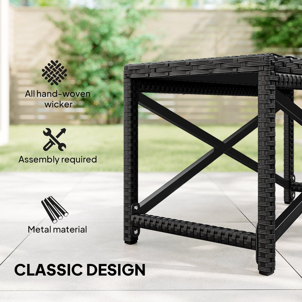 Close up of the garden table showing the metal frame and woven detail