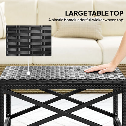 A hand touches the woven top of the coffee table, showing the plastic board underneath