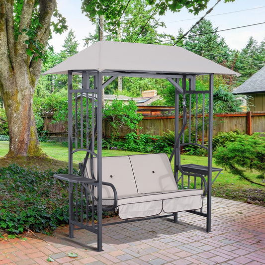 The garden swing chair is set up on a patio next to some greenery