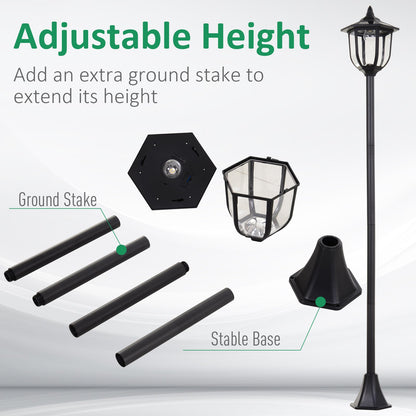 The solar post lamp parts laid out, showing sections of the pole, base and ground stake