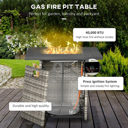 The gas fire pit showing the internal hose and burner structure with a cat sitting nearby