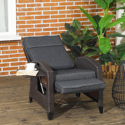 The garden recliner placed on a wooden deck with a book and cup on the side tray