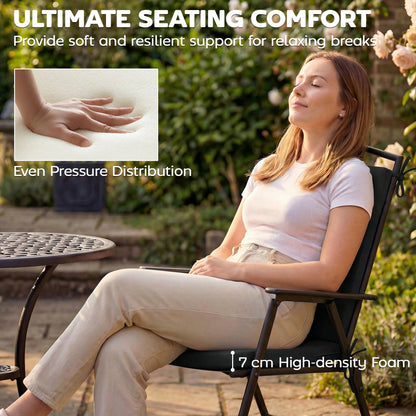 Woman relaxing on a garden chair with a black seat pad