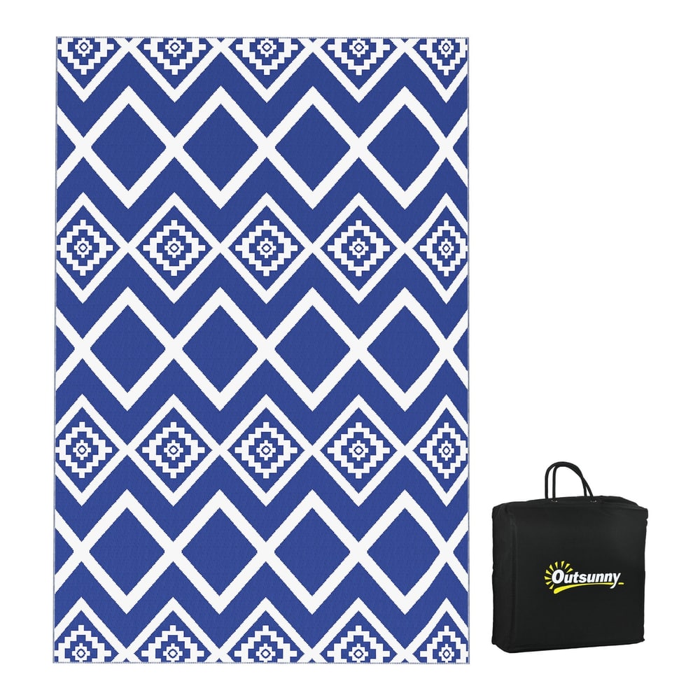 Outsunny Plastic Straw Reversible RV Outdoor Rug laid flat with a black carry bag beside it