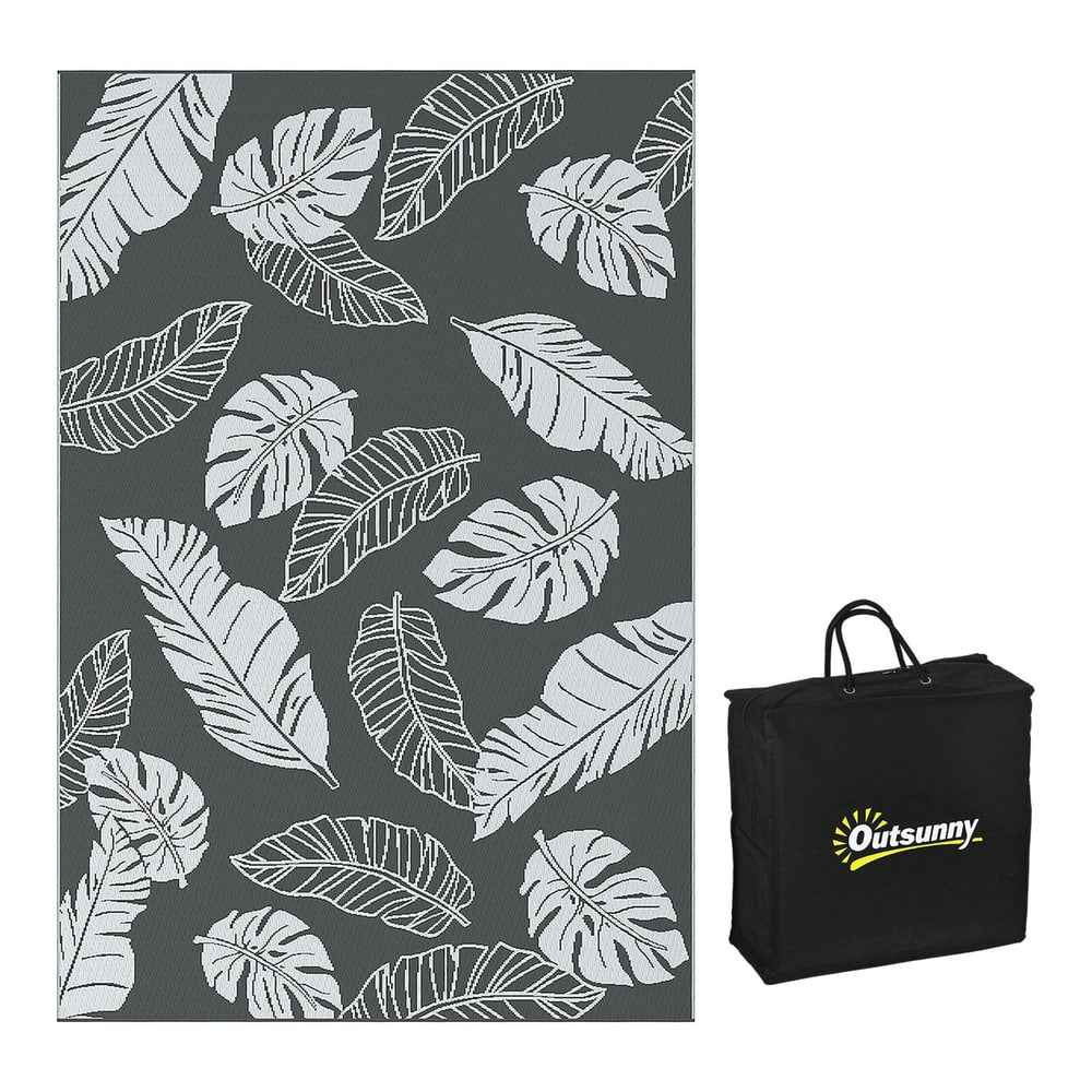 Outsunny Plastic Straw Reversible RV Outdoor Rug with a grey background and white leaf pattern, next to its black carry bag