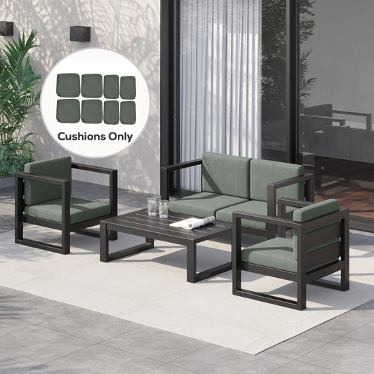 Deep grey outdoor seat covers shown on a rattan furniture set on a patio
