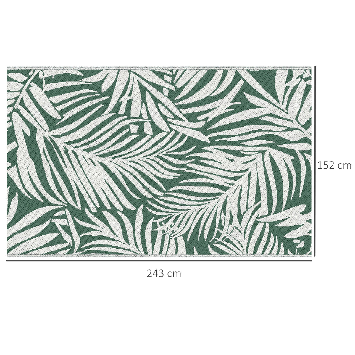 The reversible outdoor rug shows a green leaf pattern on a white background
