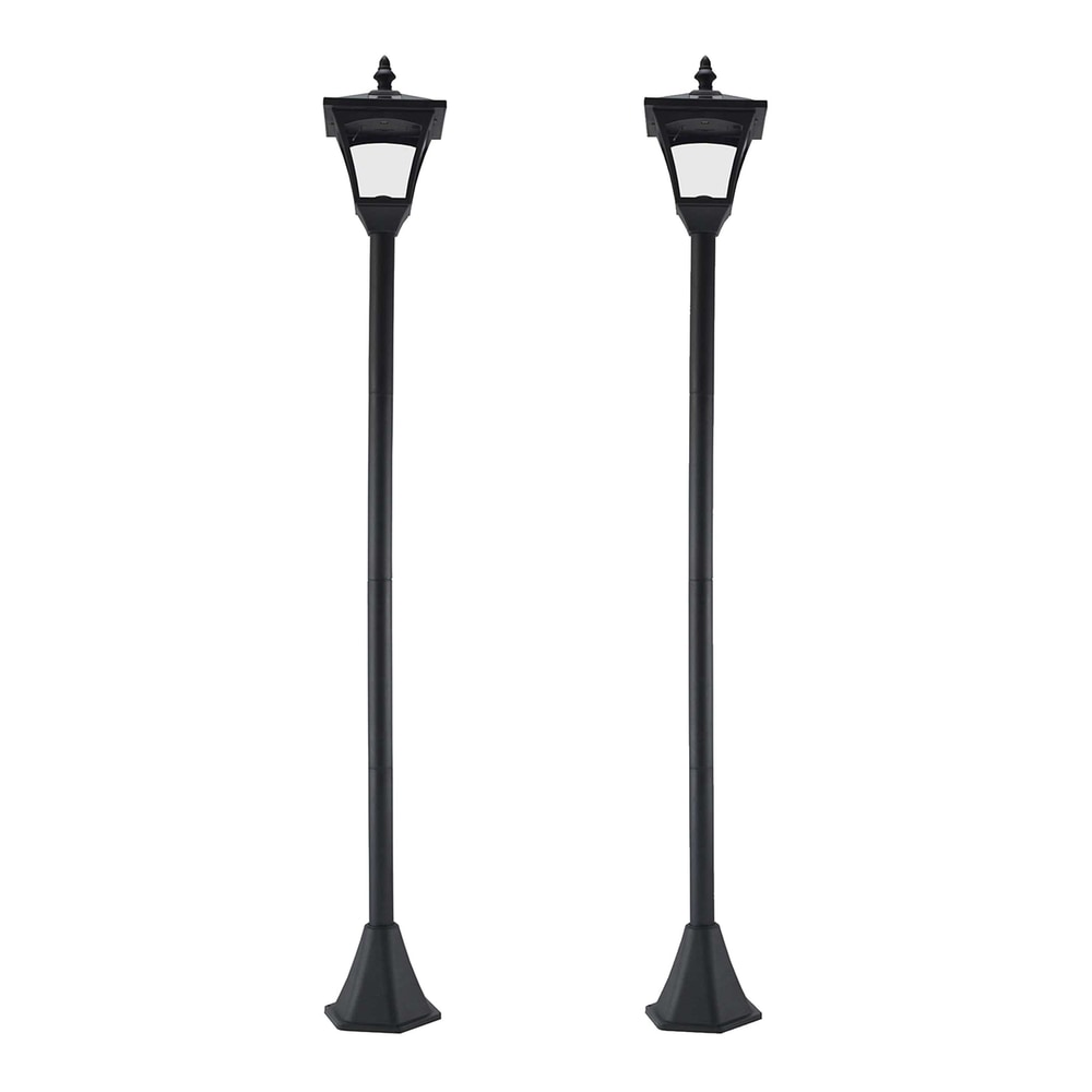 Outsunny Set of 2 Outdoor Garden Solar Post Lamp in black standing side by side