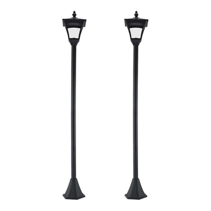 Outsunny Set of 2 Outdoor Garden Solar Post Lamp in black standing side by side