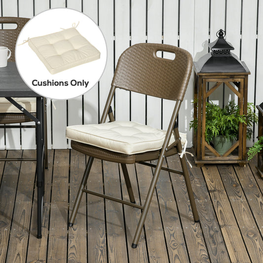 Cream white garden seat cushion on a brown chair on a wooden deck