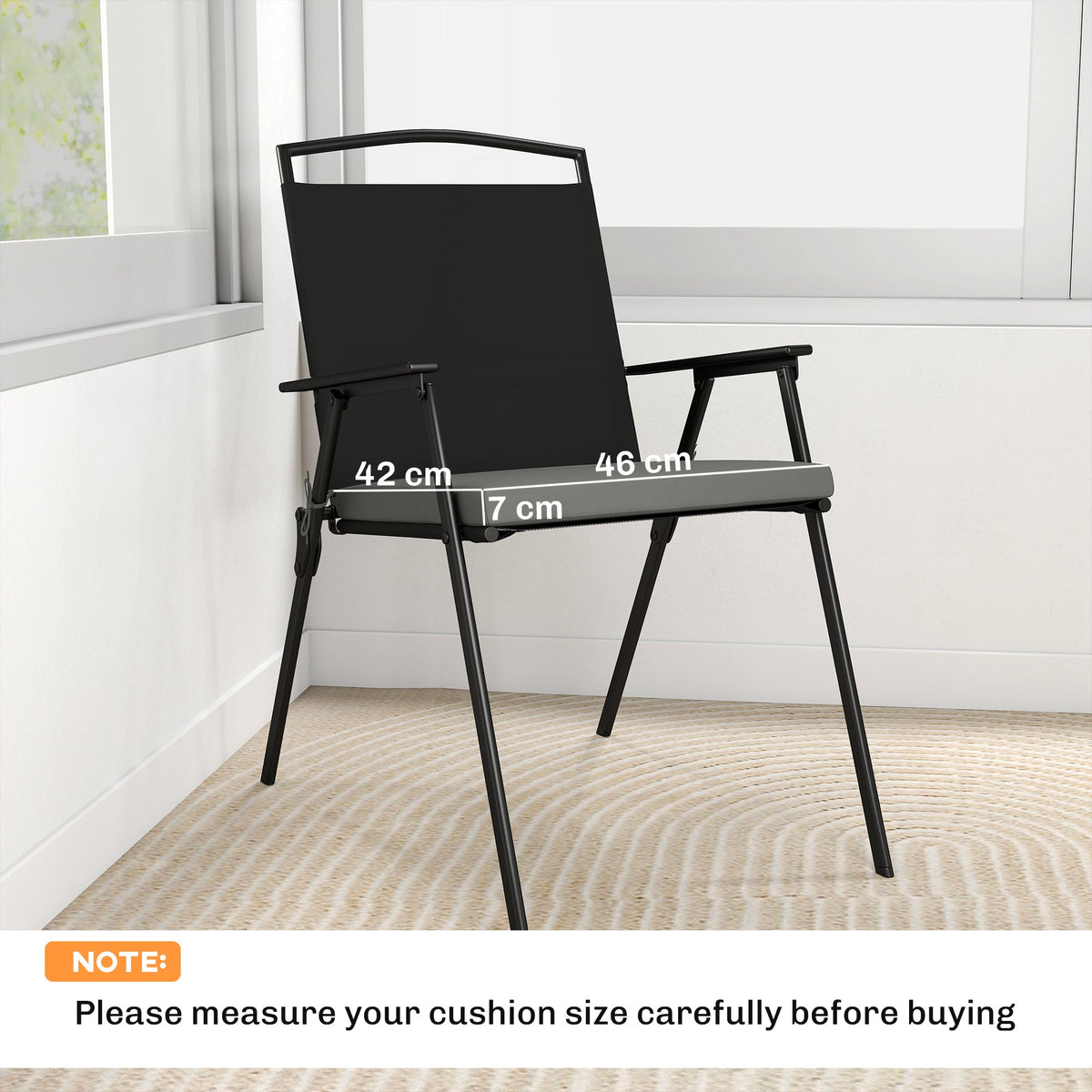 A stack of dark grey outdoor seat cushions with dimensions shown
