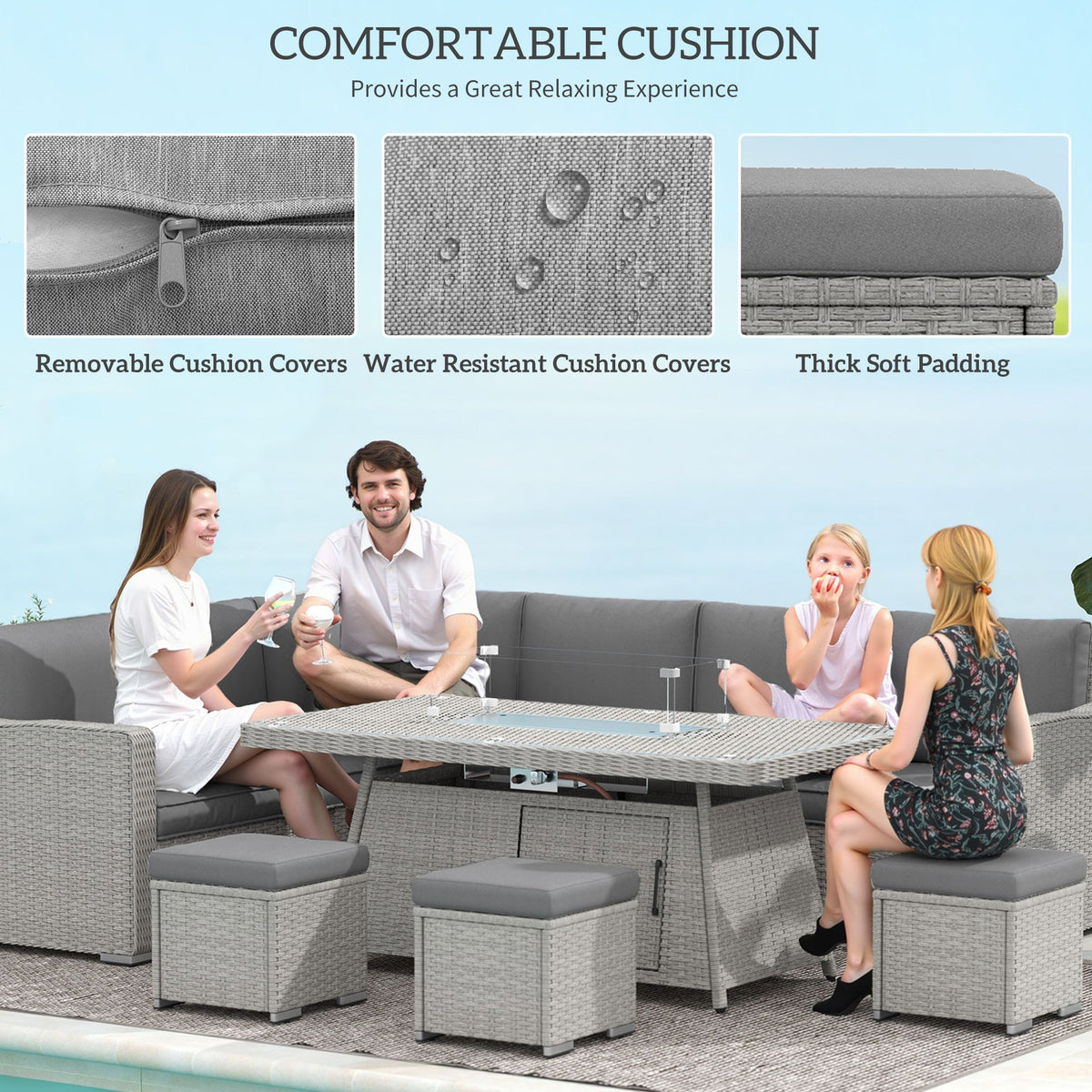 Family relaxing on the grey rattan sofa set with firepit table and cushions