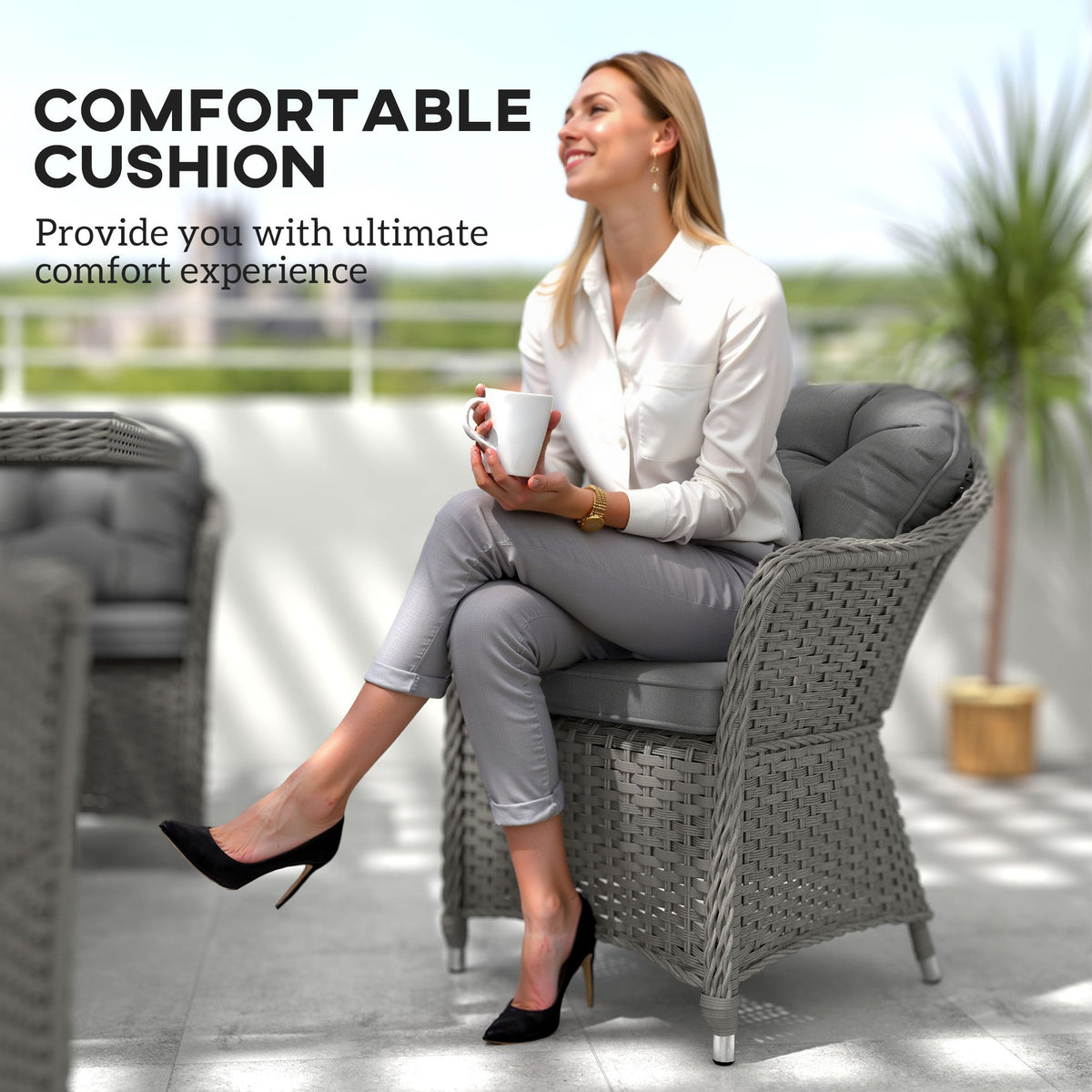 Woman relaxing on a chair from the rattan dining set