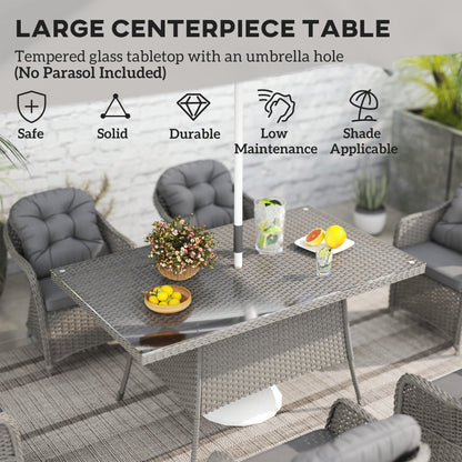 Close-up of the glass tabletop on the rattan dining set with drinks and fruit