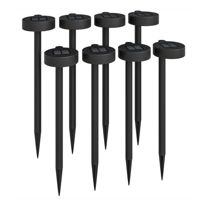 Outsunny Solar Lights arranged in a group of eight black garden stakes with solar panels on top