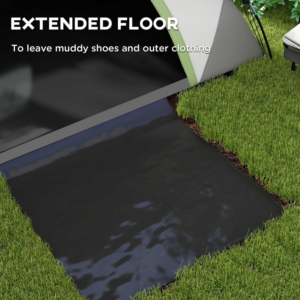 The extended floor of the green and grey camping tent, designed to keep muddy shoes outside