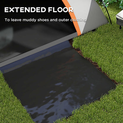 The extended floor of the orange and grey camping shelter laid out on grass