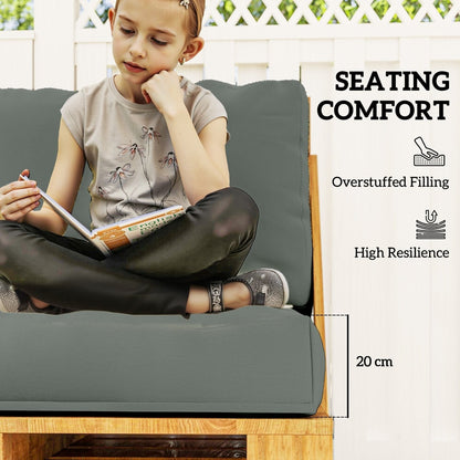 A girl sits on the comfortable charcoal grey seat cushions