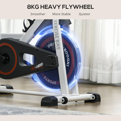 Close-up of the 8kg heavy flywheel on the white exercise bike