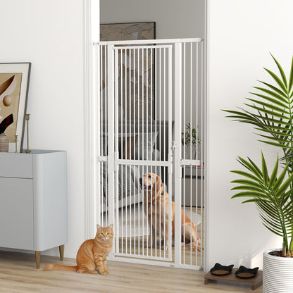 The dog gate installed in a doorway with a cat sitting in front and a dog behind it