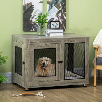 The dog crate placed in a living room with a golden retriever resting inside on a cushion