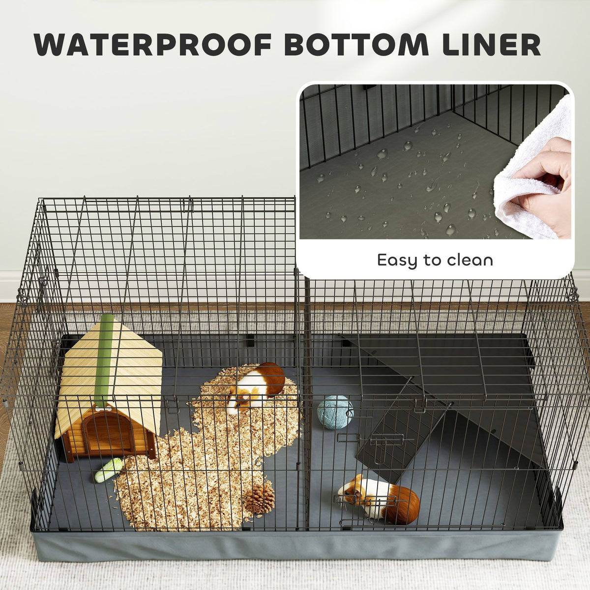 The small animal cage with an inset showing a hand wiping the waterproof bottom liner