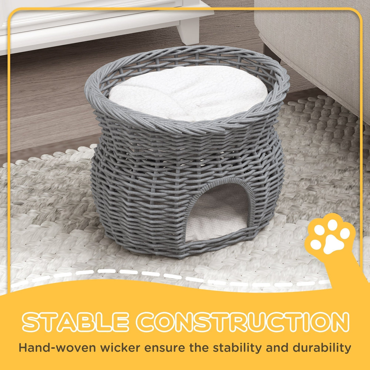 Close up of the grey wicker cat house showing the woven texture and cushion