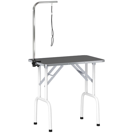 PawHut 32" Foldable Dog Grooming Table with a black surface and a metal grooming arm attached