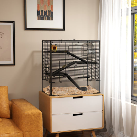 the hamster cage placed on a wooden cabinet in a living room setting