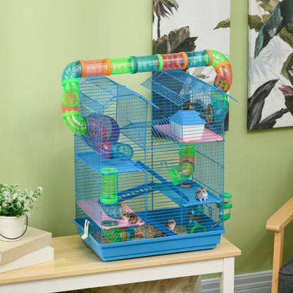 The hamster cage placed on a wooden table in a room with two small hamsters inside