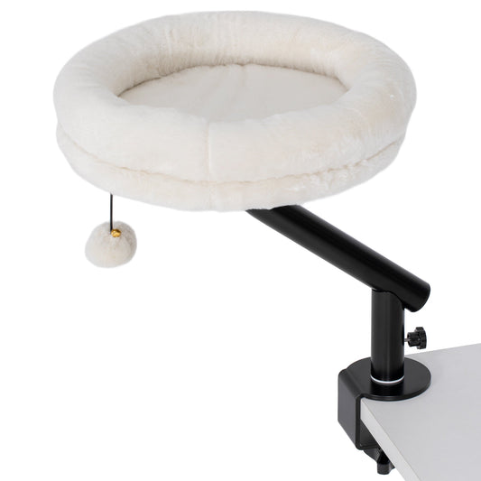 PawHut Cat Desk Bed with a soft cream white circular cushion and a hanging toy attached to a table