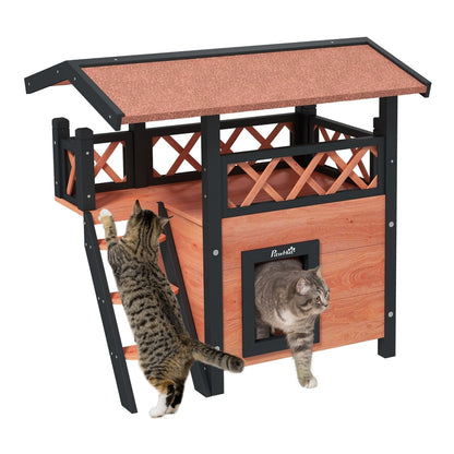 PawHut Cat House Outdoor w/ Balcony Stairs Roof with two cats climbing and entering the structure