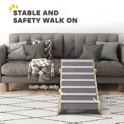 The pet climbing ladder has anti-slip strips on its carpeted surface, shown next to a sofa