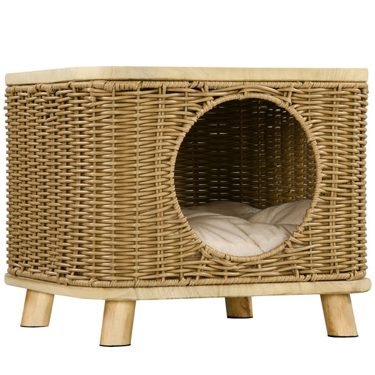 PawHut Elevated Design Wicker Cat House with Washable Cushion, a light brown woven cube with a round entrance and four wooden