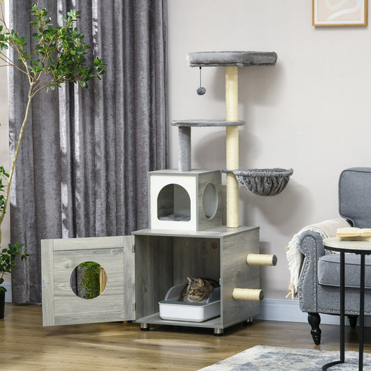 This grey wooden litter box with house and scratching posts is shown in a living room setting