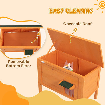 The wooden cat house with an open roof and an inset showing the removable floor panel