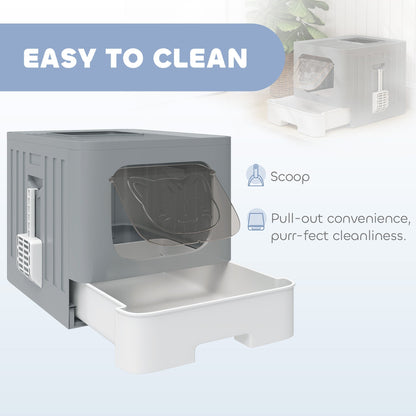 Close up of the grey and white enclosed litter box with the drawer pulled out showing the scoop and ease of cleaning