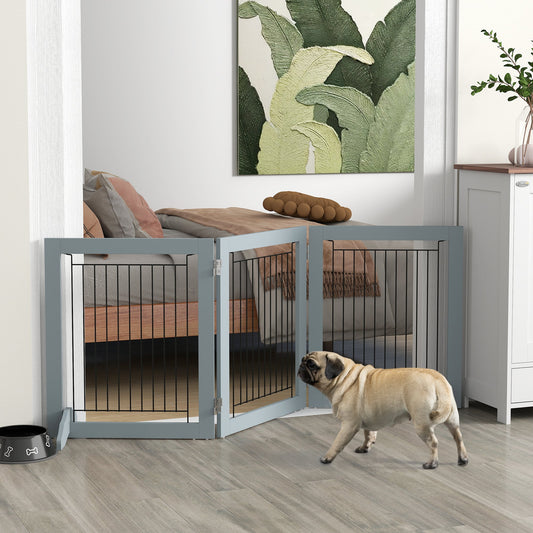 The dog gate positioned in a doorway with a small dog standing in front of it in a bedroom