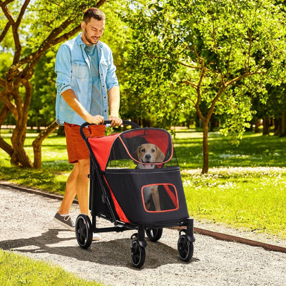Man pushing a dog carrier stroller with a dog inside while walking on a path