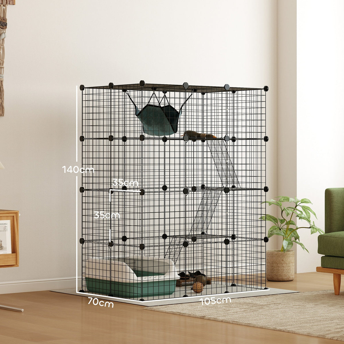 A large black wire cat enclosure with dimensions marked, showing its height and width